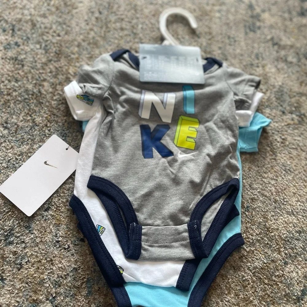 Nike Baby Short Sleeve Bodysuit in Aqua with Navy Trim